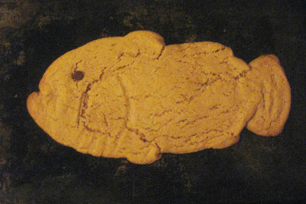 Salmon-turned-clownfish peanut butter cookie after baking